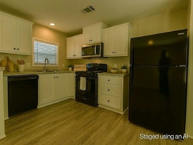 Own your own home in a quiet, well-maintained neighborhood! This - photo 3