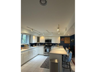 This lush and stunning property boasts 3.6 acres of protected - photo 3