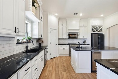 Welcome to this fully customized home on 1.4 acres with a pond! - photo 11