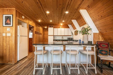 Welcome to 15685 Pine Street, a charming vintage A-frame nestled - photo 14