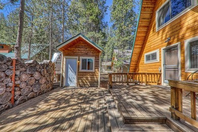 Welcome to 15685 Pine Street, a charming vintage A-frame nestled - photo 25
