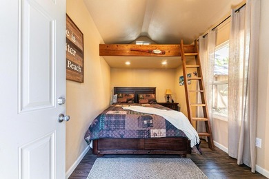 Welcome to 15685 Pine Street, a charming vintage A-frame nestled - photo 26