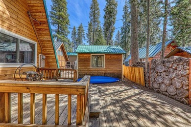 Welcome to 15685 Pine Street, a charming vintage A-frame nestled - photo 27