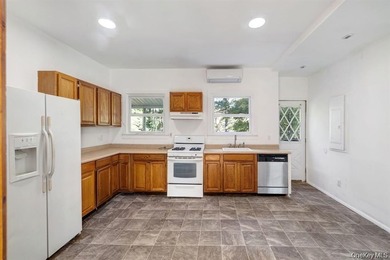 Welcome to this ranch-style home in Liberty City, located in the - photo 3
