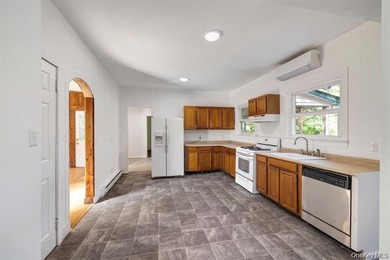Welcome to this ranch-style home in Liberty City, located in the - photo 4