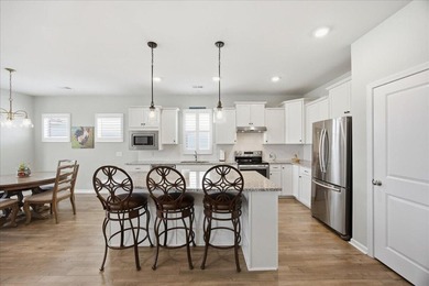 Welcome to elevated living in the GATED golf course community of - photo 11