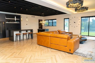 Come view this exquisite channel-front coastal home. With its - photo 3