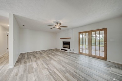 Welcome to 12302 Country Club Drive in the desirable Sandy Creek - photo 5