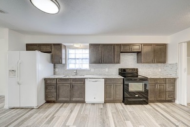 Welcome to 12302 Country Club Drive in the desirable Sandy Creek - photo 8