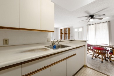Two bedroom 1.5 bath second floor condo priced to sell in very - photo 10