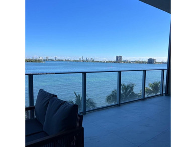 Stunning 1-bedroom plus den fully furnished waterfront residence