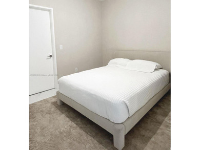 Stunning 1-bedroom plus den fully furnished waterfront residence