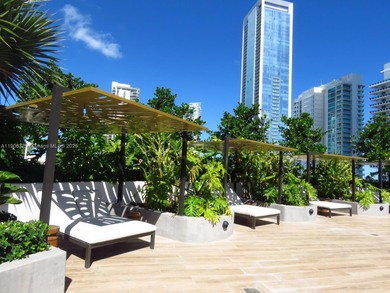 Stunning 1-bedroom plus den fully furnished waterfront residence