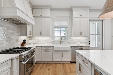 New Construction on East Beach with a pool and a rooftop deck! - photo 11