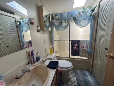 Enjoy this charming 2-bedroom, 2-bathroom home featuring a front - photo 12