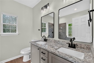 This completely renovated, turn-key four-bedroom, two-bathroom - photo 23