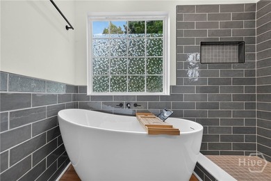 This completely renovated, turn-key four-bedroom, two-bathroom - photo 24