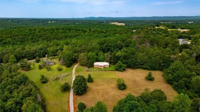 Great home built by a builder for a builder! Tucked away and