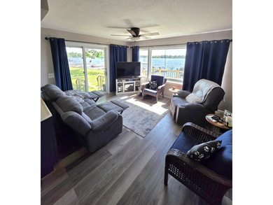 Enjoy waterfront living in this charming 2-bedroom, 1-bath home - photo 33