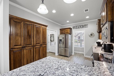 Discover low-maintenance living at its finest in this - photo 5