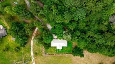 Great home built by a builder for a builder! Tucked away and