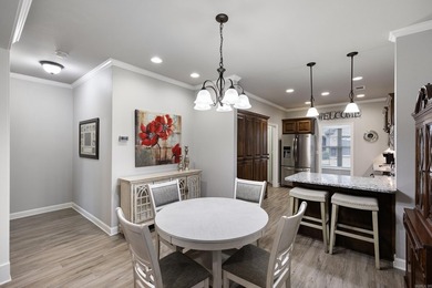 Discover low-maintenance living at its finest in this - photo 8