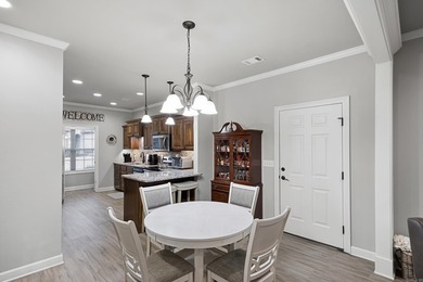 Discover low-maintenance living at its finest in this - photo 9