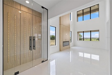 Luxury living in the highly sought-after gated community of - photo 9
