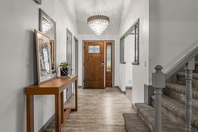 Stunning 1.5-story home in the highly desirable College Hill