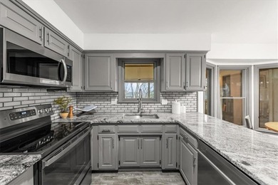 Stunning 1.5-story home in the highly desirable College Hill