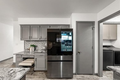 Stunning 1.5-story home in the highly desirable College Hill