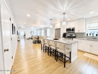 Completely reimagined, this exceptional raised ranch offers 3 - photo 12