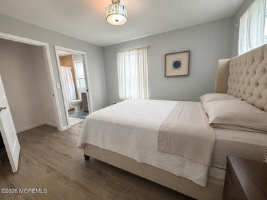 Completely reimagined, this exceptional raised ranch offers 3 - photo 13