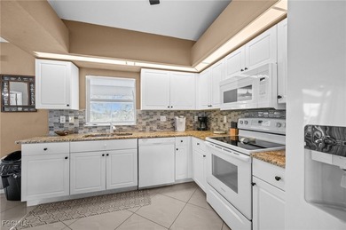 Welcome to this beautifully maintained 4-bedroom, 2-bath - photo 8