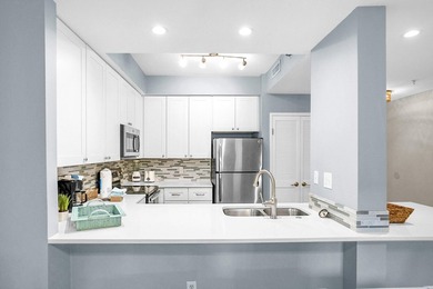 Enjoy effortless beach living from this beautifully updated - photo 2