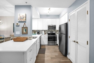 Enjoy effortless beach living from this beautifully updated - photo 3