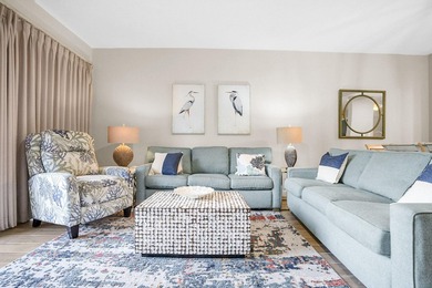 Enjoy effortless beach living from this beautifully updated - photo 5