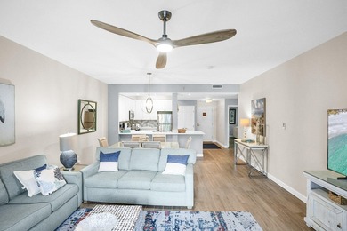 Enjoy effortless beach living from this beautifully updated - photo 6