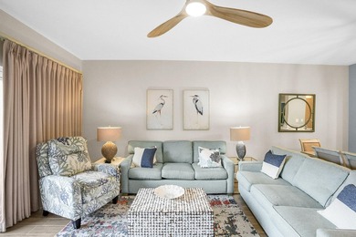 Enjoy effortless beach living from this beautifully updated - photo 7