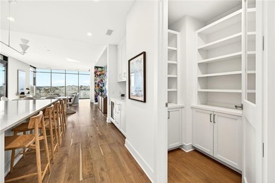 Set above the Buckhead skyline, this refined residence at The