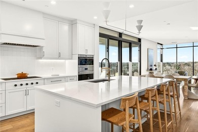 Set above the Buckhead skyline, this refined residence at The