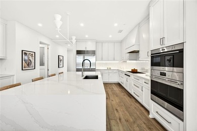 Set above the Buckhead skyline, this refined residence at The