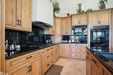 Nestled within an exclusive gated golf course community, this - photo 11