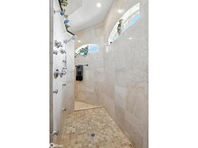 Nestled within an exclusive gated golf course community, this - photo 17