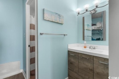 Experience coastal living at its finest in this beautifully