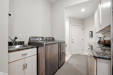 Nestled within an exclusive gated golf course community, this - photo 18