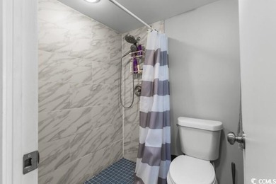 Experience coastal living at its finest in this beautifully