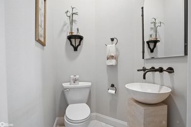 Nestled within an exclusive gated golf course community, this - photo 19