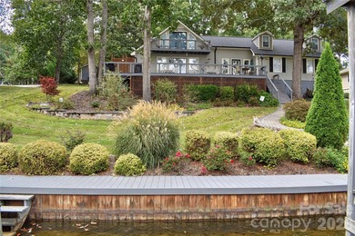 This waterfront home is located off Badin Lake's main channel - photo 4
