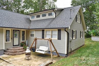 This waterfront home is located off Badin Lake's main channel - photo 5